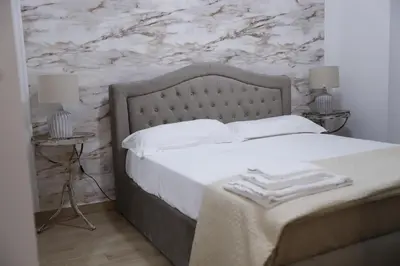 Letto o letti in una camera di Casa Sant'Anna