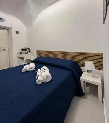 Letto o letti in una camera di Platamone Home
