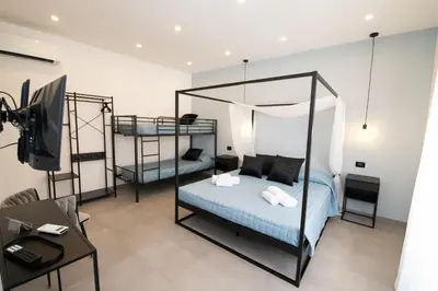 Letto o letti in una camera di Maliziusa rooms