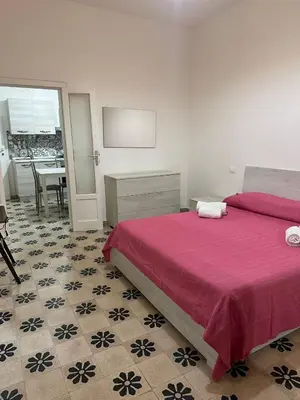 Letto o letti in una camera di la casetta di LUDOVICA