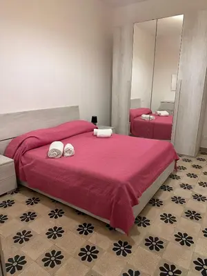 Letto o letti in una camera di la casetta di LUDOVICA