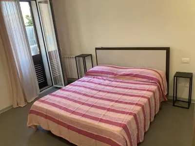 Letto o letti in una camera di Mare e Luce