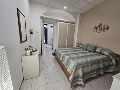 Letto o letti in una camera di Viculu Beddu - Appartamento centro storico Catania