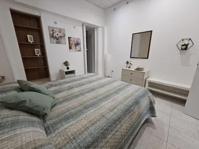 Letto o letti in una camera di Viculu Beddu - Appartamento centro storico Catania