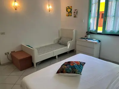 Letto o letti in una camera di Casa Ariel
