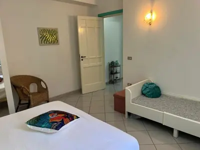 Letto o letti in una camera di Casa Ariel