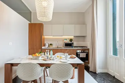 Cucina o angolo cottura di Riva Design Apartments by Wonderful Italy