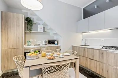 Cucina o angolo cottura di Riva Design Apartments by Wonderful Italy