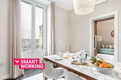 Area soggiorno di Riva Design Apartments by Wonderful Italy