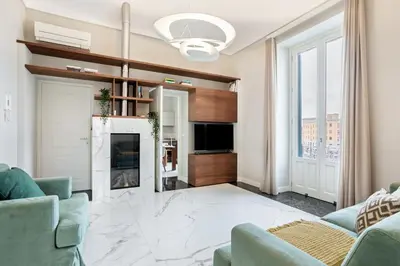 TV o dispositivi per l'intrattenimento presso Riva Design Apartments by Wonderful Italy