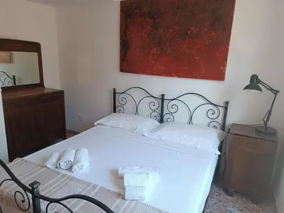 Letto o letti in una camera di La casa del gelsomino