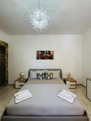 Letto o letti in una camera di Casa Vacanze Chi mi cunti