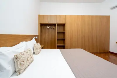 Letto o letti in una camera di Casa degli Artisti, a spacious apartment in the center