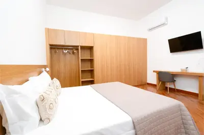 Letto o letti in una camera di Casa degli Artisti, a spacious apartment in the center