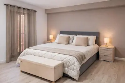 Letto o letti in una camera di La corte di Iris