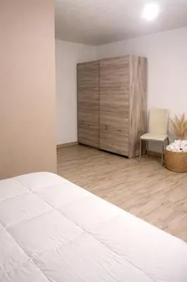Letto o letti in una camera di La corte di Iris