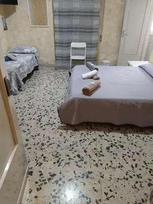 Letto o letti in una camera di fontanarossa airport room catania bagno privato in camera 800 mt aeroporto