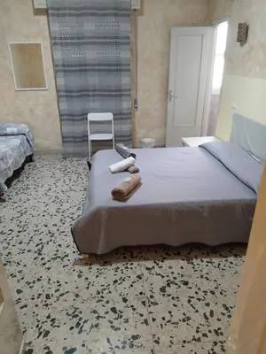 Letto o letti in una camera di fontanarossa airport room catania bagno privato in camera 800 mt aeroporto