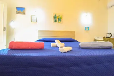 Letto o letti in una camera di fontanarossa airport room catania bagno privato in camera 800 mt aeroporto