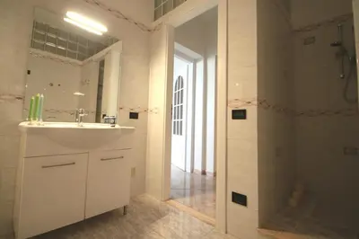 Bagno di Dimora sicula a due passi dal mare con patio verde