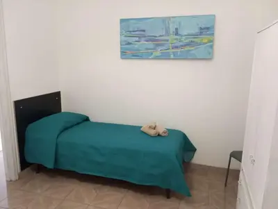 Letto o letti in una camera di Casa vacanza I Due Mori