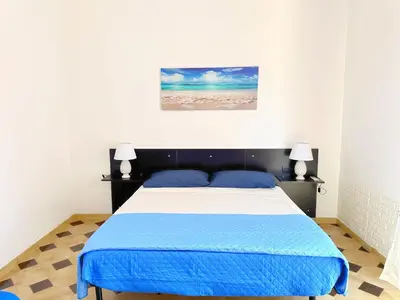 Letto o letti in una camera di Casa vacanza I Due Mori