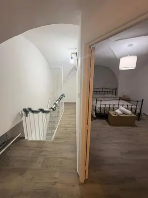 Letto o letti in una camera di RitAria Centro storico di Catania