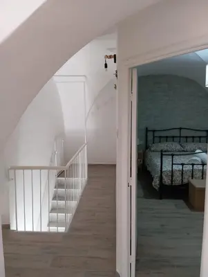 Letto o letti in una camera di RitAria Centro storico di Catania