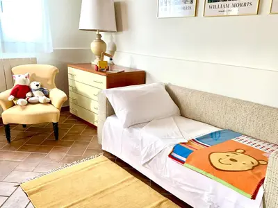Letto o letti in una camera di Incantevole villa con piscina e giardino a poca distanza dalle spiagge piu belle