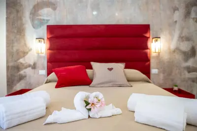 Letto o letti in una camera di DimorAmare LUXURY BeB POOL AND BEACH