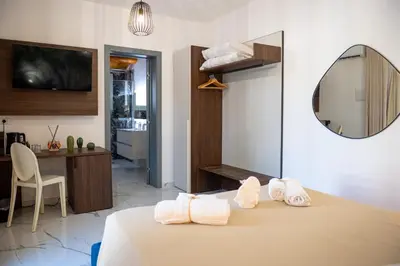 Letto o letti in una camera di DimorAmare LUXURY BeB POOL AND BEACH