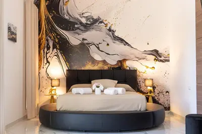Letto o letti in una camera di DimorAmare LUXURY BeB POOL AND BEACH