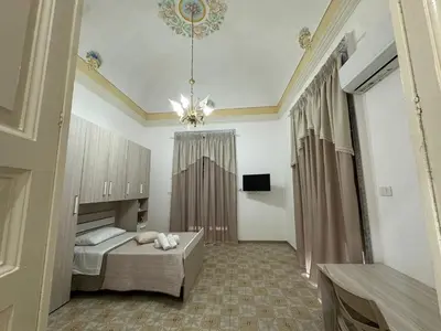 Letto o letti in una camera di Rosmyri Apartment