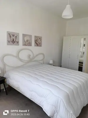Letto o letti in una camera di Rosemary
