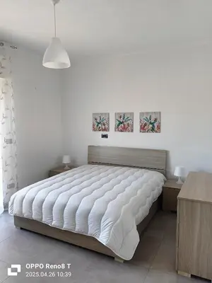 Letto o letti in una camera di Rosemary