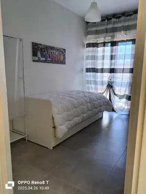 Letto o letti in una camera di Rosemary