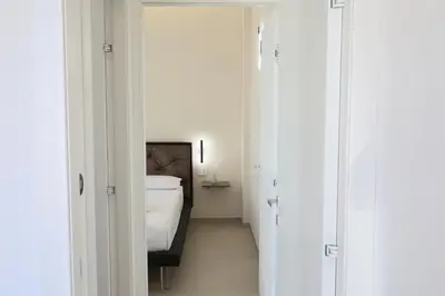 Letto o letti in una camera di DR Luxury Apartments