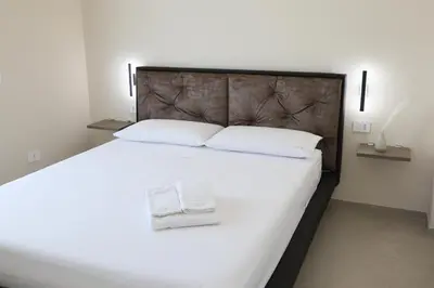 Letto o letti in una camera di DR Luxury Apartments