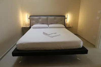 Letto o letti in una camera di DR Luxury Apartments