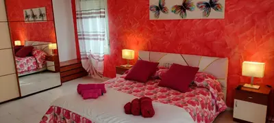 Letto o letti in una camera di casa Rubino