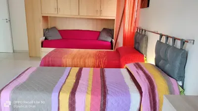 Letto o letti in una camera di casa Rubino
