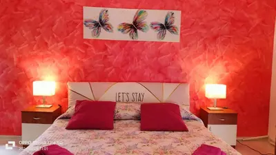 Letto o letti in una camera di casa Rubino