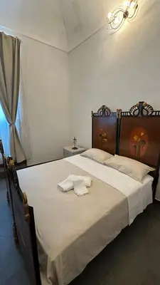 Letto o letti in una camera di Casa Enza 17