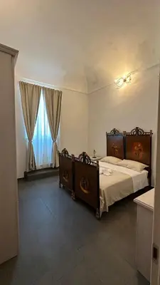 Letto o letti in una camera di Casa Enza 17