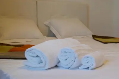 Letto o letti in una camera di Villa Belvedere