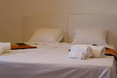 Letto o letti in una camera di Villa Belvedere