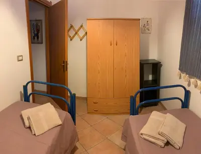 Letto o letti in una camera di Villa Kore