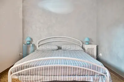 Letto o letti in una camera di Cosentino apartment