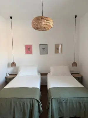 Letto o letti in una camera di Nimia Portopalo