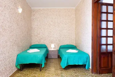 Letto o letti in una camera di Catania Antica